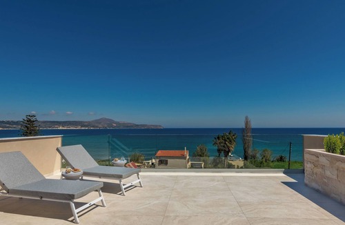 Kalyves Apartment | Villa Azurios - 2 Minute walk to the beach, with parking & lift access.