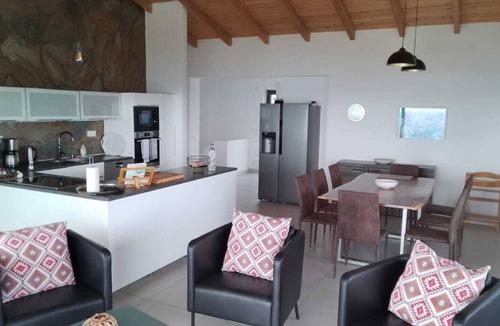 Marathias Villa | Villa VIO right on the ocean/beach with a pool—kilometers of sandy beach