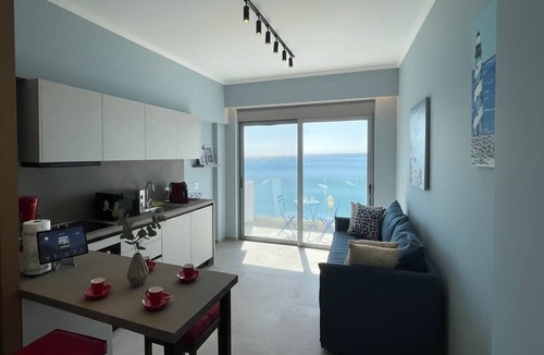 Haraki Apartment | Waterfront Stay in Charaki