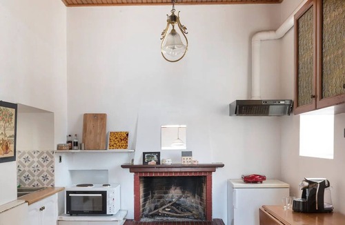 Poros House | Waterfront townhouse with private garden