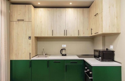 Bar Apartment | XIO Apartments | Stylish Comfort with Balconies & Full Kitchens