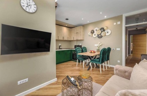 Bar Apartment | XIO Apartments | Stylish Comfort with Balconies & Full Kitchens