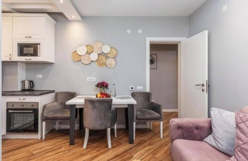 Bar Apartment | XIO Apartments | Stylish Comfort with Balconies & Full Kitchens