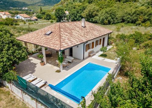 Adorable family villa with swimming pool and olive garden