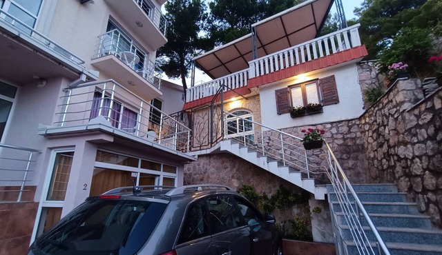An apartment in a complex in a pine forest