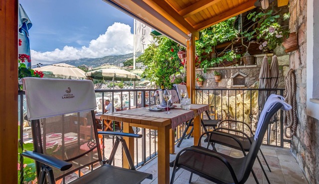 Beachfront 2BR Apartment with Terrace & Sea View