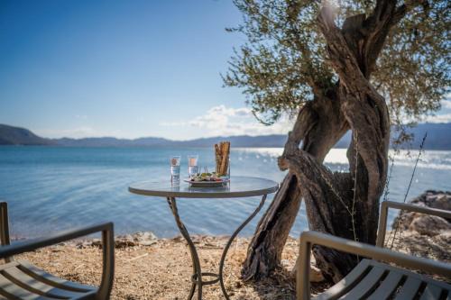 Beautiful Traditional Stone House in the private Sea Front Olive Grove of Elaionas Nikou Luxury Villas in Alyfantá