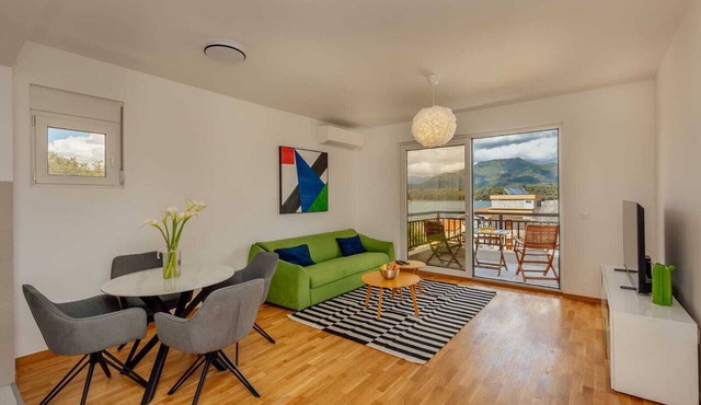 Brand new, cozy, one-bedroom apartment, with a sea view and garage.