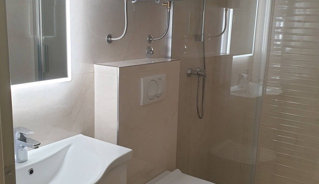 Comfortable studio apartment with patio, two minutes walk from the nearest beach