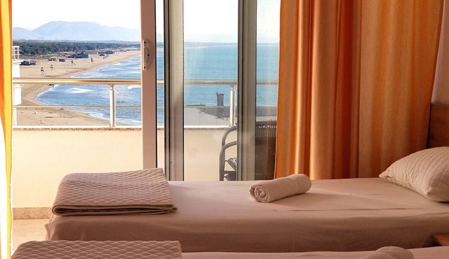 Comfy twin room with separated beds, double sofa bed - sea view balcony