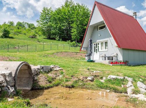 Cottage by the brook