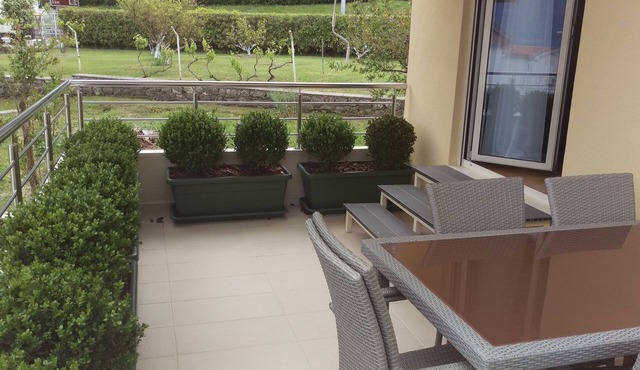 Deluxe 2 Bedroom Apartment with Terrace and Private Garage