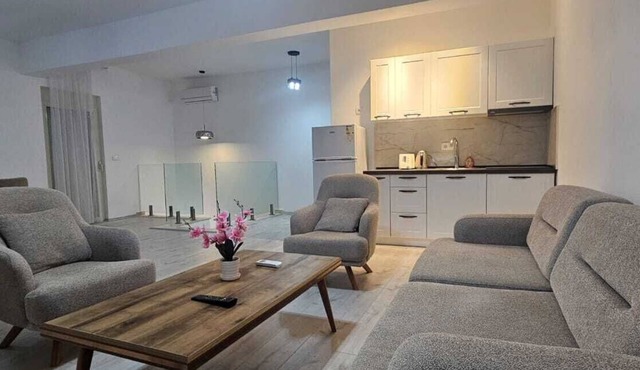 Deluxe duplex vacation rental with a hot tub, just 5 minutes from the sandy beach