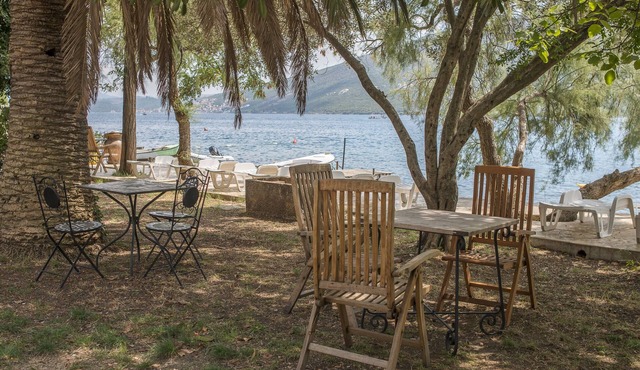 Deluxe Room with Balcony Steps from the Sea in Denovici