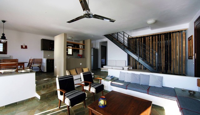 Elegant beachfront house with amazing sea view and beautiful garden in Gavrio
