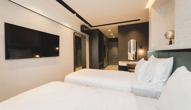 Elegant Haven w/City Views – Breakfast, Parking, Private Balcony