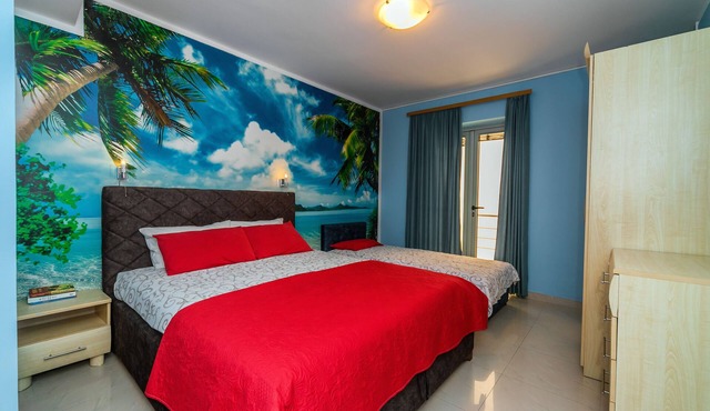 Exclusive 2 bedrooms apartment, 2 minutes walk to a sandy beach.