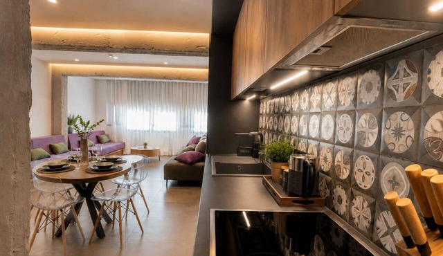 Gold & Concrete Acropolis Residence