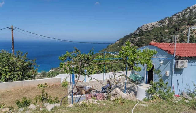 Irene's Cottage Myrtonas | Hilltop Sea View Retreat