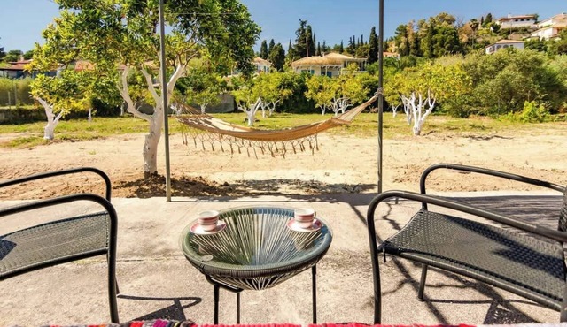 Koroni Beachfront Retreat, Private Garden Haven
