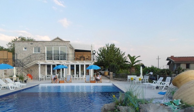 Lustica Apartments in Mrkovi with view of the open sea.