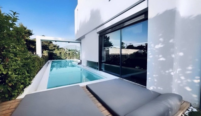 Luxury duplex 310m2 with large private pool and garden at the Athens Riviera.