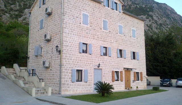 Luxury penthouse in traditional stone villa overlooking Kotor Fjord