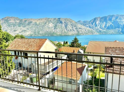 Prcanj sunny port apartments with shared pool