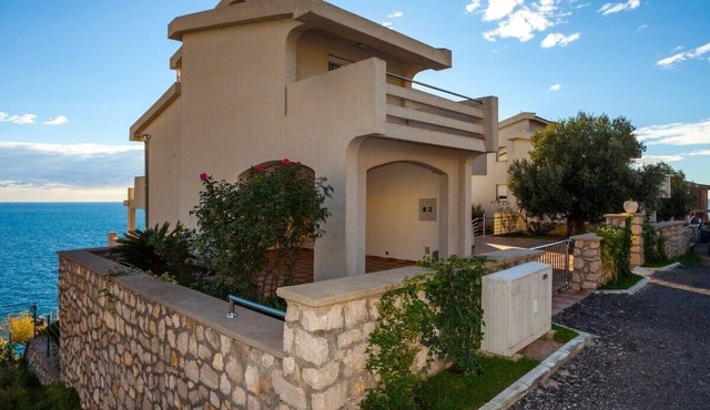 Seafront villa with pool
