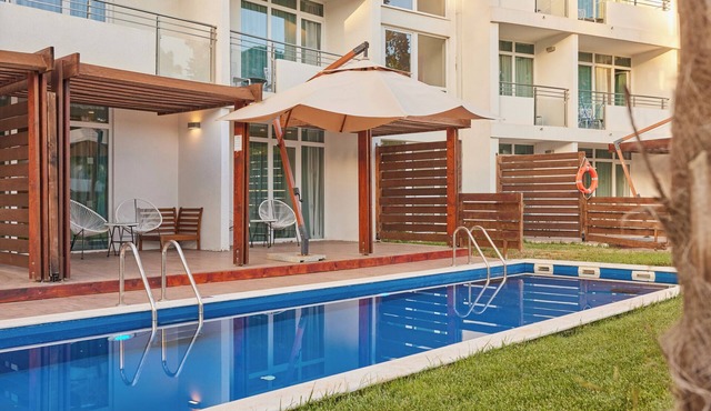 Short Drive to Valdanos Beach! TWO Modern 2BR Suites, Outdoor Pools, Beachfront!
