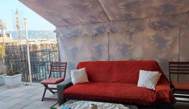 Spacious private rooftop studio, mountain and sea view in Athens