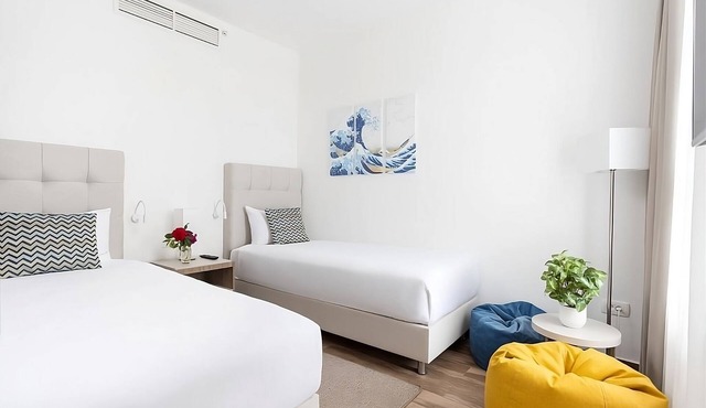 Ultimate Beach Escape! TWO Spacious 2BR Suites! Swimming Pools, Spa, Beachfront!