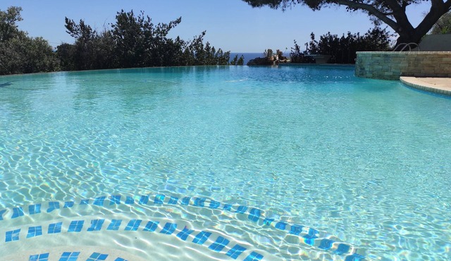 VILLA WITH 3 UNITS AROUND AMAZING INFINITY POOL AND SEA-VIEW in Agia Marina