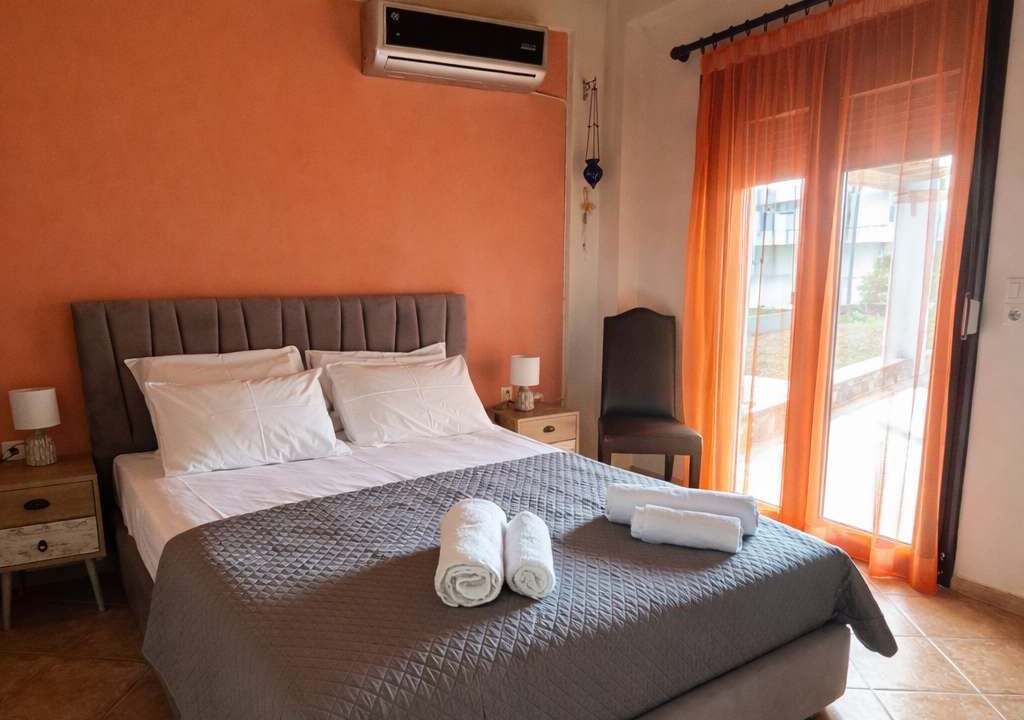 Photo of Bedroom in Ormos Koumeikon
