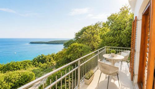 One-Bedroom Apartment with Balcony and Sea View