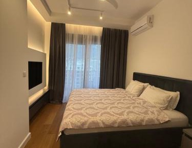 Two-Bedroom Apartment with Balcony and Sea View