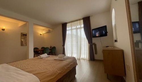 Two-Bedroom Apartment balcony and sea side left side