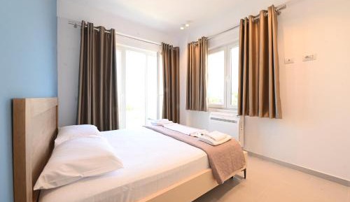 Two-Bedroom Apartment with Balcony and Sea View