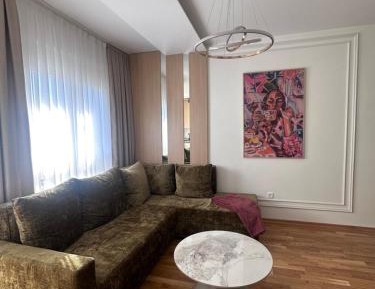 One-Bedroom Apartment with Balcony and Sea View