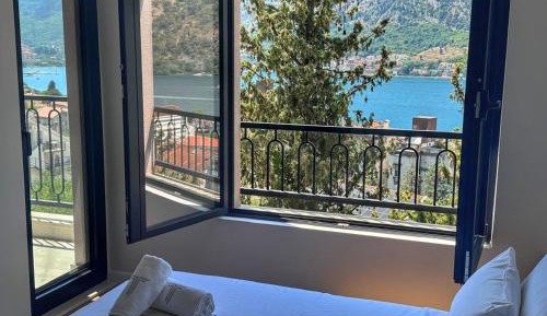 One-Bedroom Apartment with Balcony and Sea View