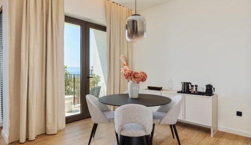 One-Bedroom Apartment with Balcony and Sea View