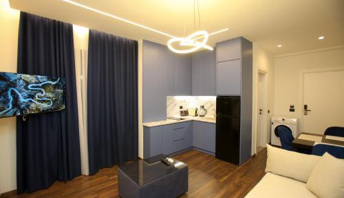 One-Bedroom Apartment with Balcony and Sea View