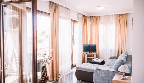 One-Bedroom Apartment with Balcony and Sea View