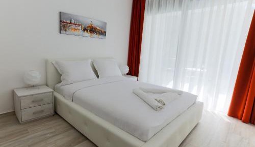 One-Bedroom Apartment with Terrace and Side Sea View