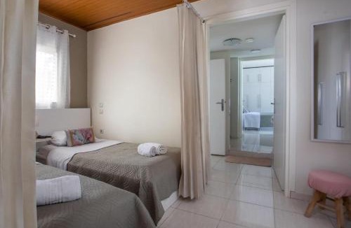 Petaloudes House | Sea Breeze & Nature villa, with heated pool and garden retreat