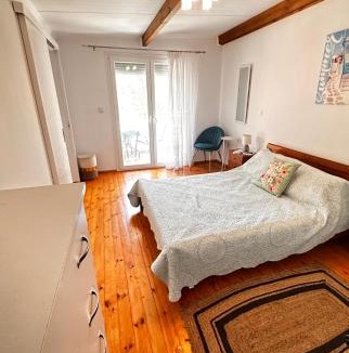 Arcoudi House | Philoxenia! Beachfront House with Garden on the Sand