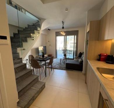 Luxury Maisonette with Shared Pool
